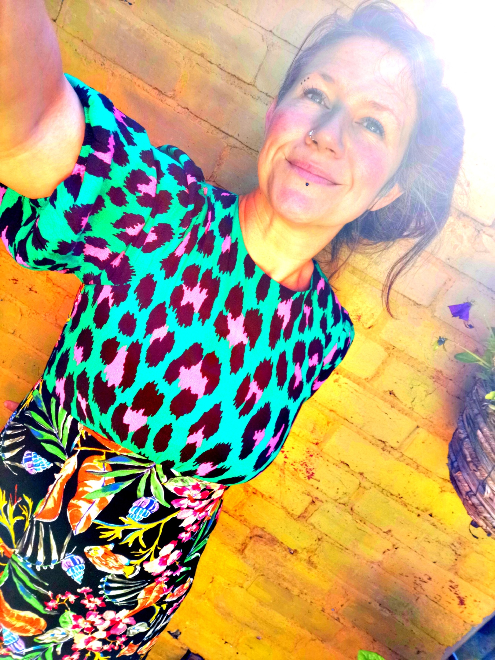 This is me. Giddy about flowers. A simple woman who wants to help make her corner of the world a better place to be!